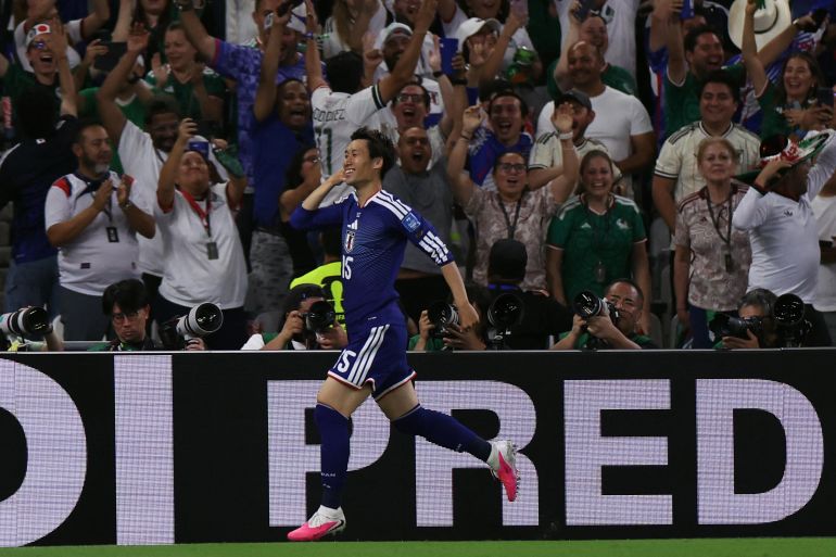 El mediocampista japonés No. 15 Daichi Kamada celebra luego de anotar el primer gol de su equipo durante el partido de fútbol de la Copa Mundial 2026 entre Túnez y Japón en el Estadio Monterrey en Guadalupe, México, el 20 de junio de 2026. (Foto: Julio Cesar AGUILAR / AFP)
